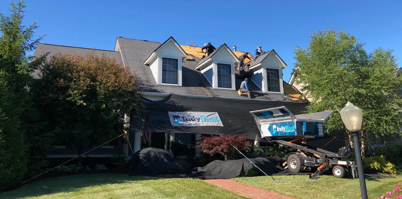 Tarping and dry-in on a Stones Crossing commercial roof